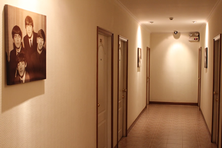Pattaya Secrets Beatles Poster in hallway
